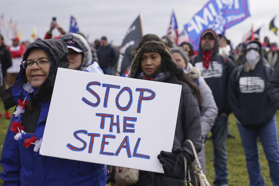 Supporters loyal to President Donald Trump attend a rally on the Ellipse near the White House on Jan. 6, 2021, in Washington. (AP Photo/John Minchillo)