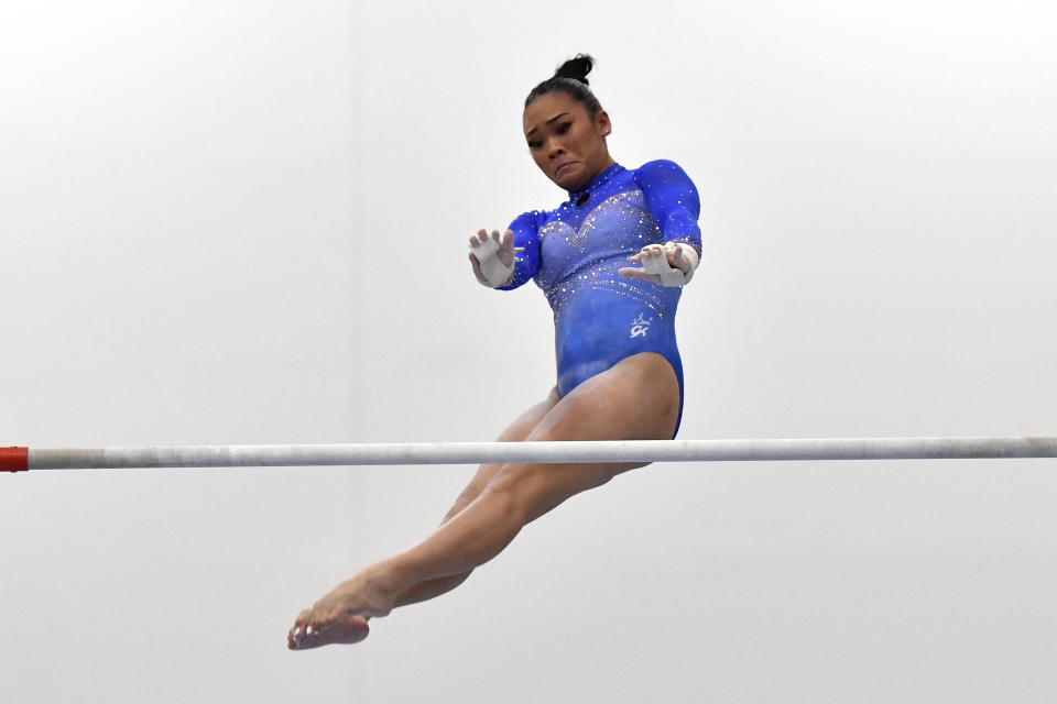 Sunisa Lee performs on the uneven bars at the USA Gymnastics Winter Cup competition in Louisville, Ky., Saturday, Feb. 24, 2024. (AP Photo/Timothy D. Easley)