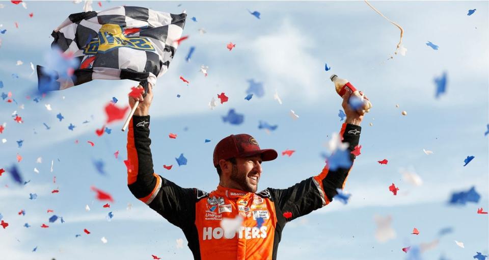 Chase Elliott celebrates his NASCAR Cup Series win at Texas in Victory Lane.