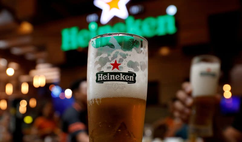 FILE PHOTO: Glasses of Heineken beer are seen at a restaurant in Hanoi