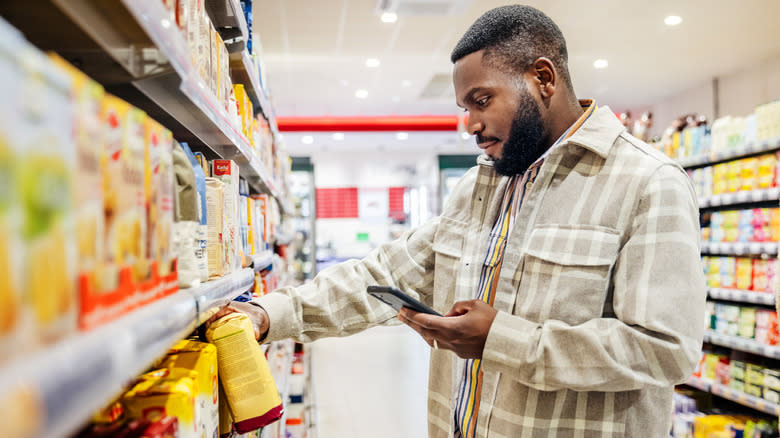 Man grocery shopping