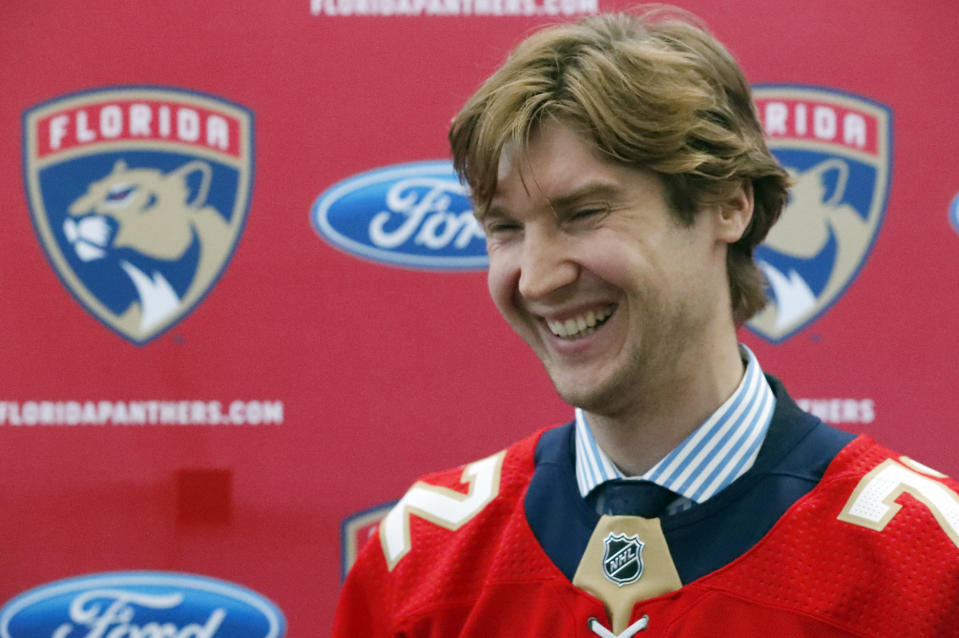 Florida Panthers new goaltender Sergei Bobrovsky laughs as he speaks during an NHL hockey news conference, Tuesday, July 2, 2019, in Sunrise, Fla. The Panthers introduced Bobrovsky, Anton Stralman, Brett Connolly and Noel Acciari. The Panthers, New York Rangers and Nashville Predators were winners on Day 1 of NHL free agency. (AP Photo/Wilfredo Lee)