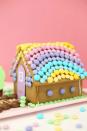 <p>This bright, pastel-roofed gingerbread house boasts plenty of color (while it lasts ... your kids are going to eat all of those petite candies!).</p><p><a href="https://lovelyindeed.com/diy-easter-bunny-gingerbread-house/" rel="nofollow noopener" target="_blank" data-ylk="slk:See more at Lovely Indeed »;elm:context_link;itc:0;sec:content-canvas" class="link "><em>See more at Lovely Indeed »</em></a></p>