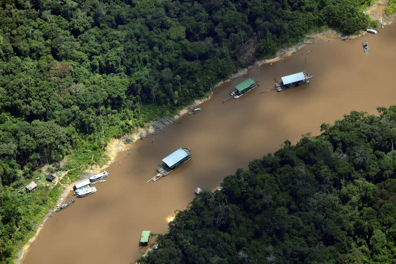 Dredgers used for illegal gold extraction are seen during a joint operation between Colombian and Brazilian authorities in the Amazon jungles