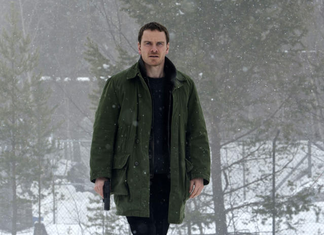 This image released by Universal Pictures shows Michael Fassbender in the thriller “The Snowman.” (Jack English/Universal Pictures via AP)