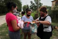 Argentine families struggle against poverty as unemployment, inflation and the pandemic batter the economy.