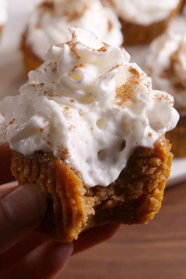 <p>Turn the classic Thanksgiving dessert into a shareable Halloween treat.</p><p><em><a href="https://www.delish.com/cooking/recipe-ideas/recipes/a50163/pumpkin-pie-cupcakes-recipe/" rel="nofollow noopener" target="_blank" data-ylk="slk:Get the recipe from Delish »;elm:context_link;itc:0;sec:content-canvas" class="link ">Get the recipe from Delish »</a></em></p>