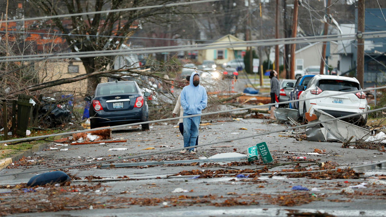 Bowling Green, Kentucky, residents look at the damage following a tornado 
