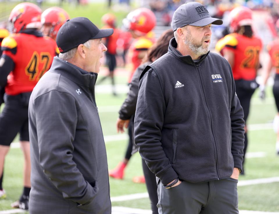 Matt Mitchell (right) was the head coach at Division II Grand Valley State the past 13 seasons.