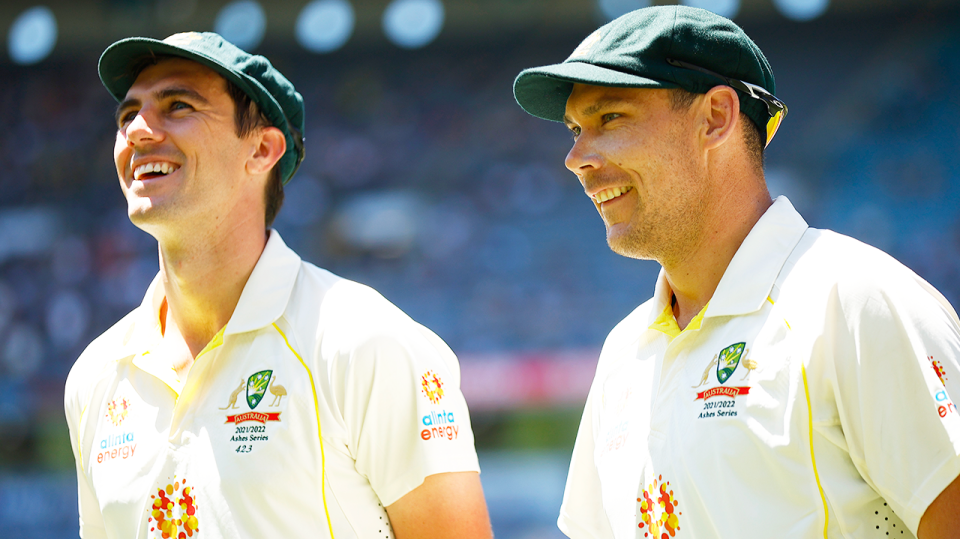 Scott Boland (pictured right) shares a laugh with Pat Cummins (pictured left).