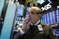 Trader Andrew Silverman works on the floor of the New York Stock Exchange, Thursday, Dec. 27, 2018. Wall Street's wild Christmas week goes on, with the Dow Jones Industrial Average slumping 300 points at the open Thursday, a day after notching its biggest-ever point gain. (AP Photo/Richard Drew)