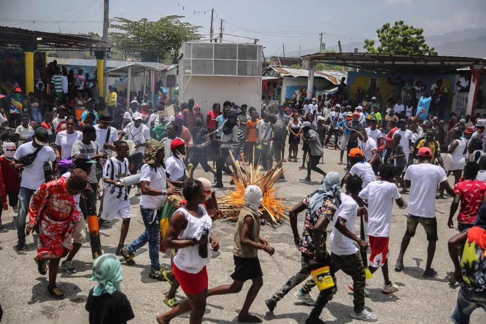 Haitians march to demand justice for slain President Jovenel Moïse in Lower Delmas, a district of Port-au-Prince, Haiti, on Monday, July 26, 2021. Moïse was assassinated on July 7 at his home.