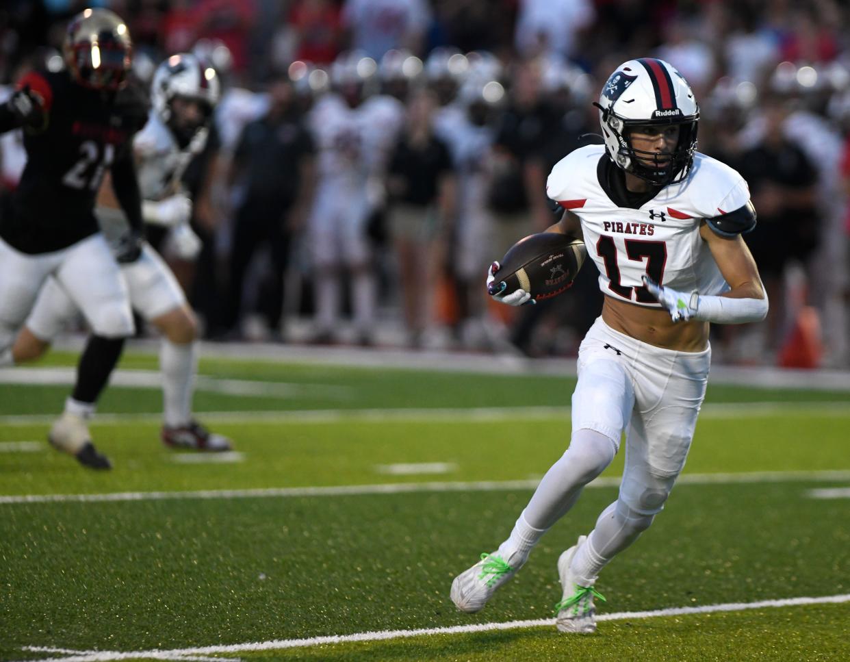 Lubbock-Cooper's Gage Piepkorn runs with the ball against Coronado in a District 2-5A Division I football game, Friday, Sept. 29, 2023, at Lowrey Field at PlainsCapital Park.