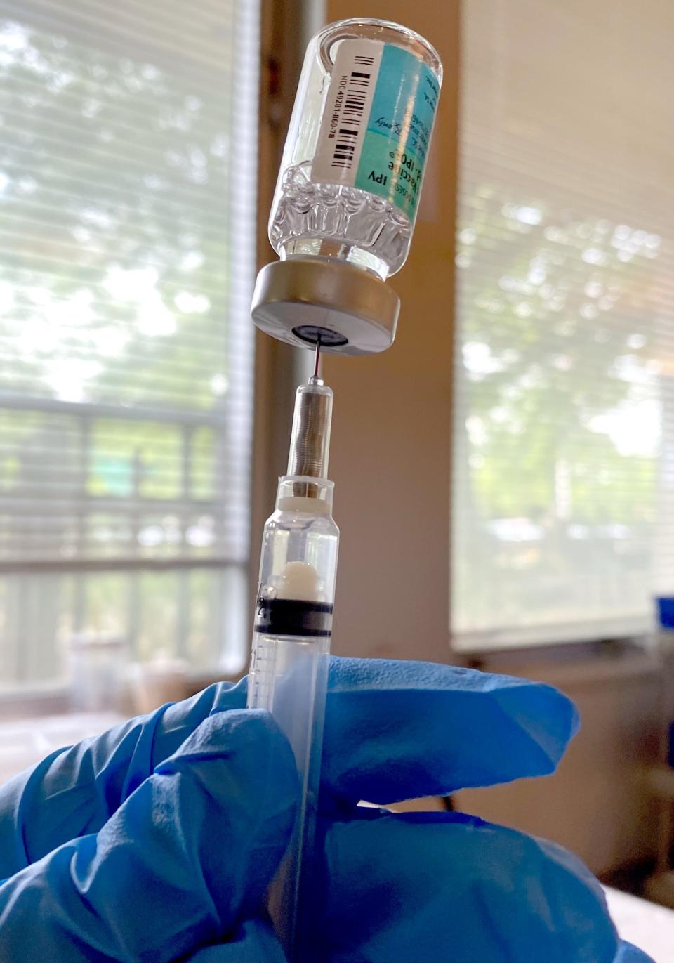 A syringe is prepared with the polio vaccine at Rockland County's Yeager Health Center in Pomona July 25, 2022.