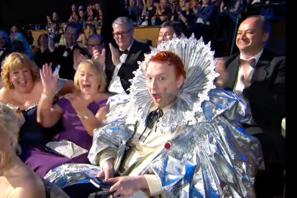 Joe Lycett, dressed as Queen Elizabeth, is surprised by his Bafta win for 'Late Night Lycett’ (BBC)