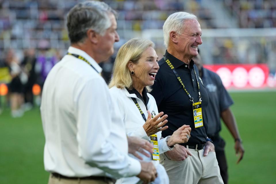 Jul 24, 2024; Columbus, OH, USA; Columbus Crew ownership group, from right, Jimmy Haslam, Dee Haslam and Pete Edwards walk across the field prior to the MLS All-Star Game at Lower.com Field.