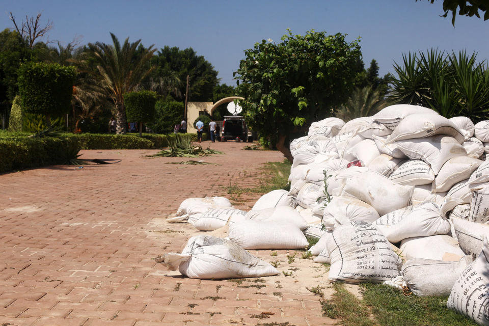 The U.S. Consulate after an attack by protesters in Benghazi, Libya, Wednesday, Sept. 12, 2012. (AP Photo/Ibrahim Alaguri)