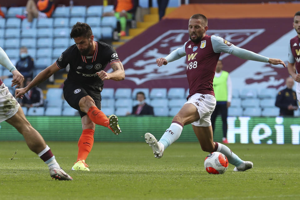 Chelsea's Olivier Giroud scores his side's second goal during the English Premier League soccer match between Aston Villa and Chelsea at the Villa Park stadium in Birmingham, England, Sunday, June 21, 2020. (Molly Darlington/Pool via AP)