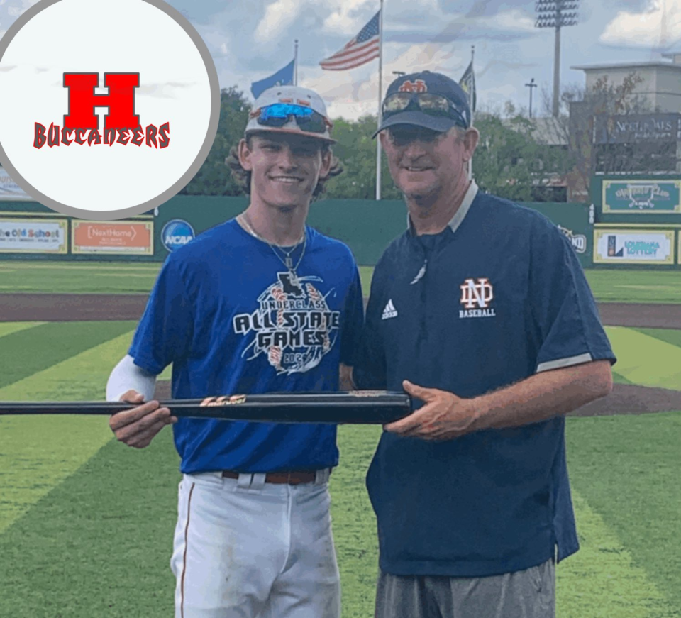 Haughton junior Christian Turner (left), pictured with North DeSoto coach Bo Odom, has verbally committed to Arkansas.