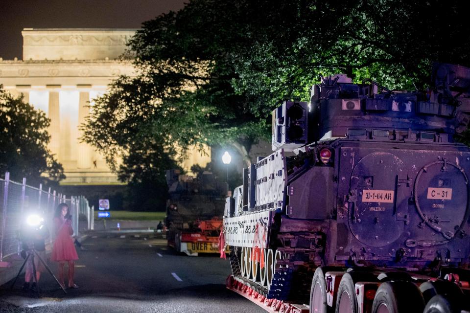 Two Bradley Fighting Vehicles are parked next to the Lincoln Memorial before President Donald Trump's "Salute to America," event honoring service branches on Independence Day.