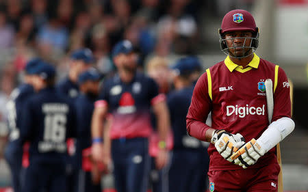 Cricket - England vs West Indies - First One Day International - Emirates Old Trafford, Manchester, Britain - September 19, 2017 West Indies' Marlon Samuels looks dejected after losing his wicket Action Images via Reuters/Jason Cairnduff