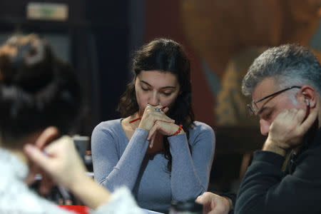 Actors read scripts during a text rehearsal of "The Slobodan Show" play in Belgrade, Serbia, January 20, 2018. Picture taken January 20, 2018. REUTERS/Djordje Kojadinovic