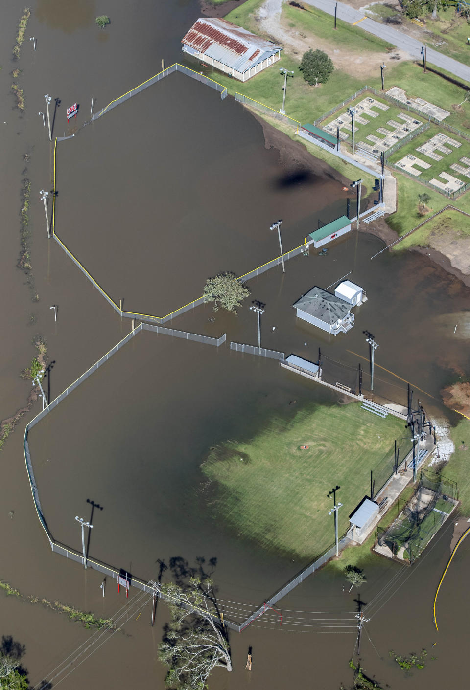 Flooded ball fields are seen in the aftermath of Hurricane Delta Saturday Oct. 10, 2020, in Welsh, La. (Bill Feig/The Advocate via AP, Pool)