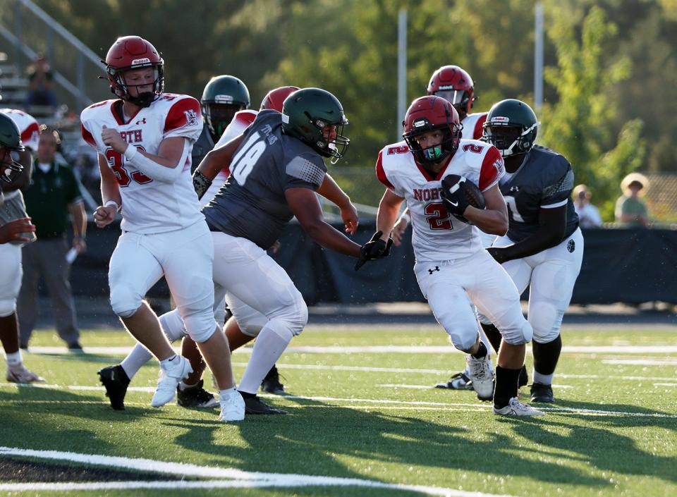 North Hagerstown's Luke Frazee carries the ball during the Hubs' 38-27 season-opening win over Tuscarora on Sept. 1, 2023. Frazee rushed for 113 yards and two touchdowns in the game.