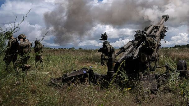 PHOTO: Ukrainian servicemen fire at Russian positions from a U.S.-supplied M777 howitzer in Kharkiv region, Ukraine, July 14, 2022. (Evgeniy Maloletka/AP)