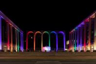 The Metropolitan Opera House is illuminated with a rainbow flag in Manhattan