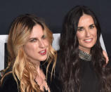 <p>Red carpet appearances are a family affair for these two: Scout Willis and her mother, Demi Moore, rocked loose waves for the show. <i>(Photo: Getty Images)</i></p>