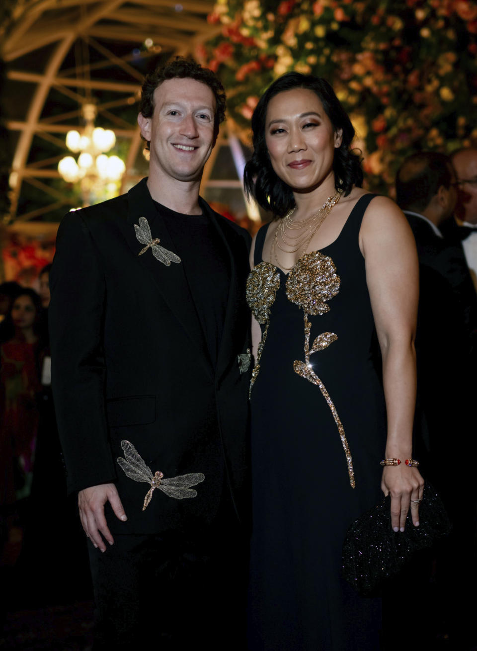 This photograph released by the Reliance group shows Mark Zuckerberg, left, and his wife Priscilla Chan at a pre-wedding bash of billionaire industrialist Mukesh Ambani's son Anant Ambani in Jamnagar, India, Friday, Mar. 01, 2024. (Reliance group via AP)