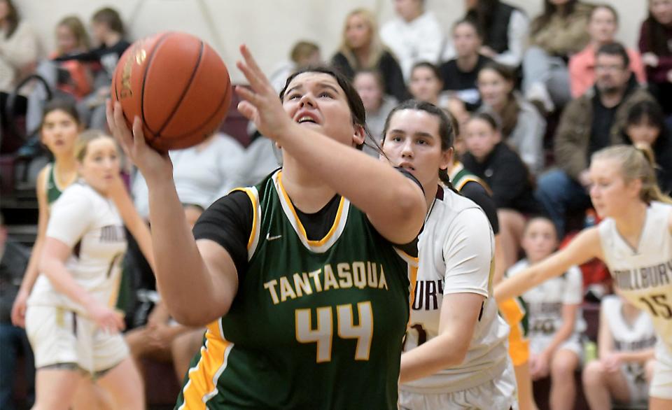 Tantasqua's Maggie Johnson takes it to the hole after getting past Millbury's Ashleigh Lagor.