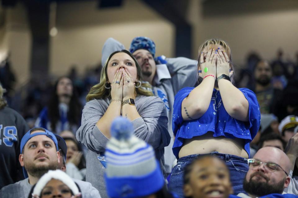 Lions fan cover their face in disbelief after San Francisco takes the lead and Detroit has a loss of down in the fourth quarter during the Detroit Lions NFC Championship watch party at Ford Field in Detroit on Sunday, Jan. 28, 2024.