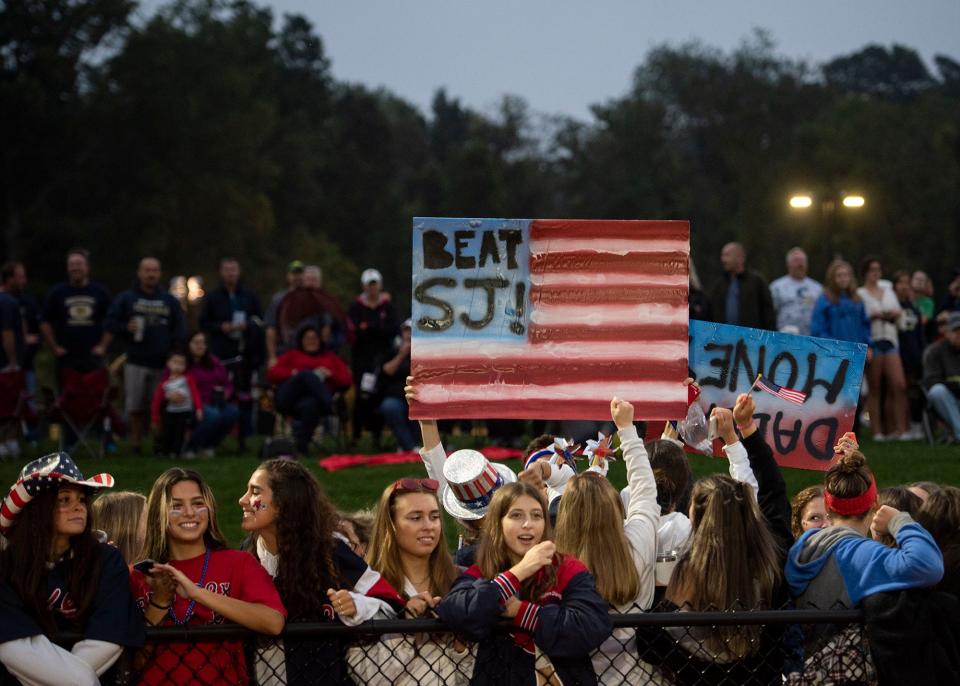 Shrewsbury fans cheer on the Colonails during the big rivalry game against St. John's on September 17, 2021.