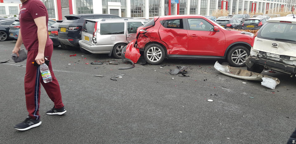 PIC BY MERCURY PRESS (PICTURED the trail of destruction left by a Range Rover after it drove into 4 parked cars at a gym in Garston, Liverpool) Mustâve been leg day! Gymgoers were shocked after a bungling female driver in a Range Rover destroyed four parked cars â before driving off. These dramatic scenes show the aftermath at 24/7 Fitness in Garston, Liverpool, this morning [THURS] after four cars were totalled by the clumsy motorist, believed to be in her early to mid-twenties. An eyewitness, who asked not to be named, spotted the carnage after finishing her workout. The woman said: âI walked out of the gym and heard a car alarm going off. SEE MERCURY COPY