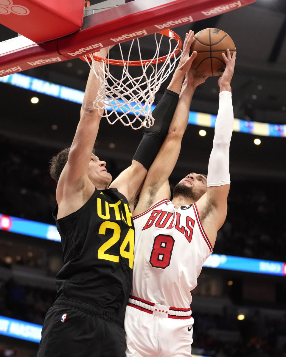 Utah Jazz's Walker Kessler (24) blocks the shot of Chicago Bulls' Zach LaVine during the first half of an NBA basketball game Monday, Nov. 6, 2023, in Chicago. (AP Photo/Charles Rex Arbogast)