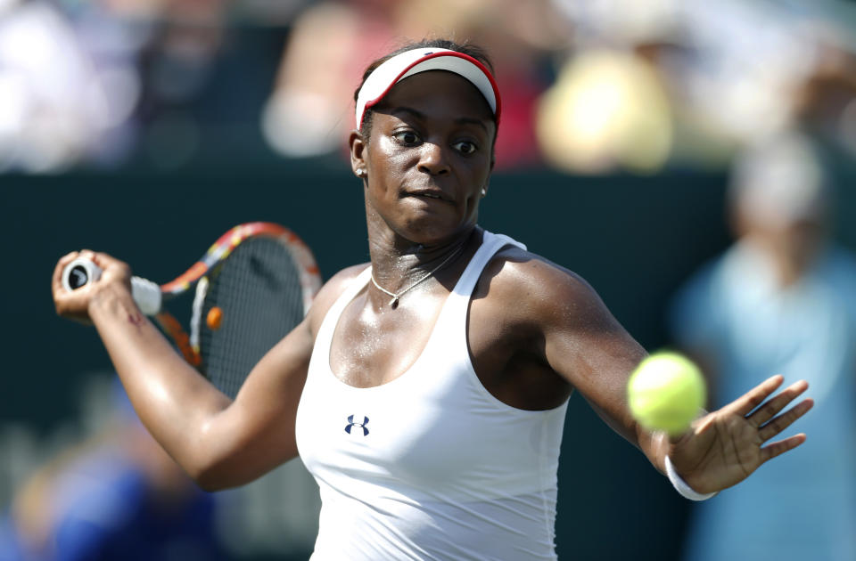 Sloane Stephens returns against Elina Svitolina, of Ukraine, during the Family Circle Cup tennis tournament in Charleston, S.C., Wednesday, April 2, 2014. Svitolina defeated Stephens 6-4, 6-4. (AP Photo/Mic Smith)