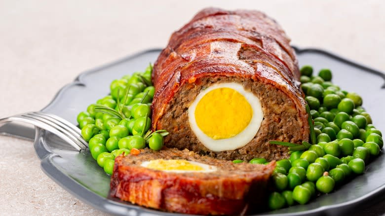 Egg-stuffed meatloaf wrapped in bacon