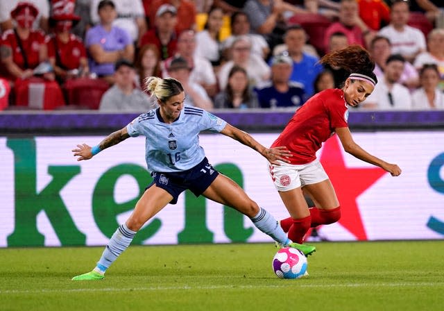 Mapi Leon, left, shields possession from Denmark’s Nadia Nadim