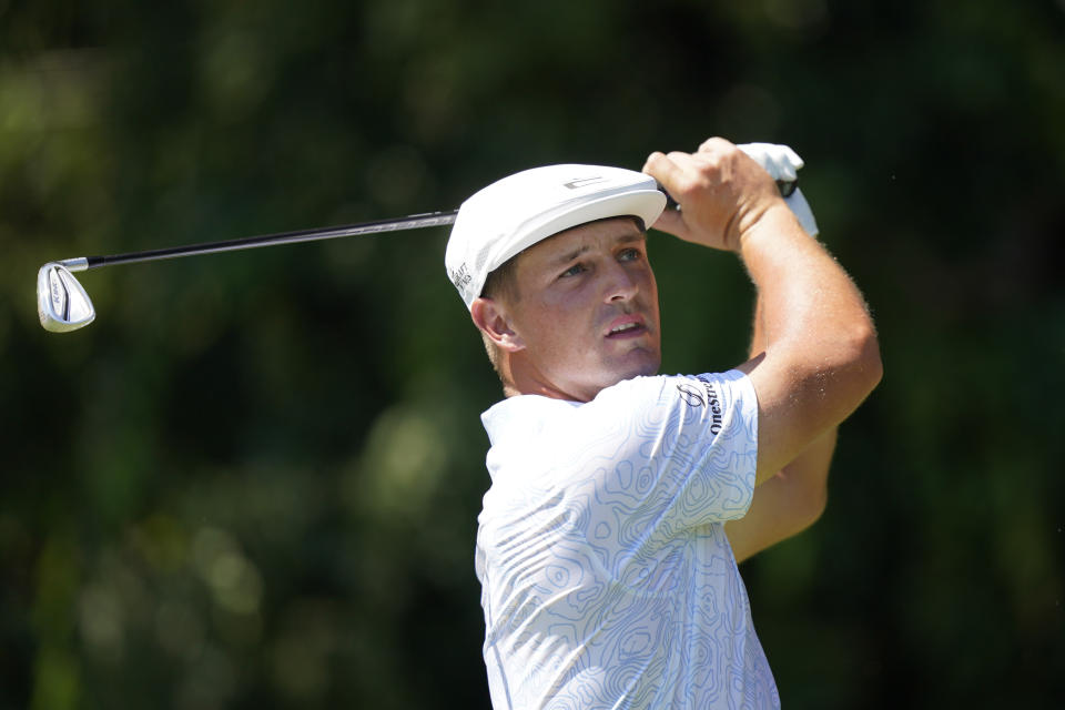 Bryson DeChambeau hits from the second tee during the third round of the Tour Championship golf tournament Saturday, Sept. 4, 2021, at East Lake Golf Club in Atlanta. (AP Photo/Brynn Anderson)