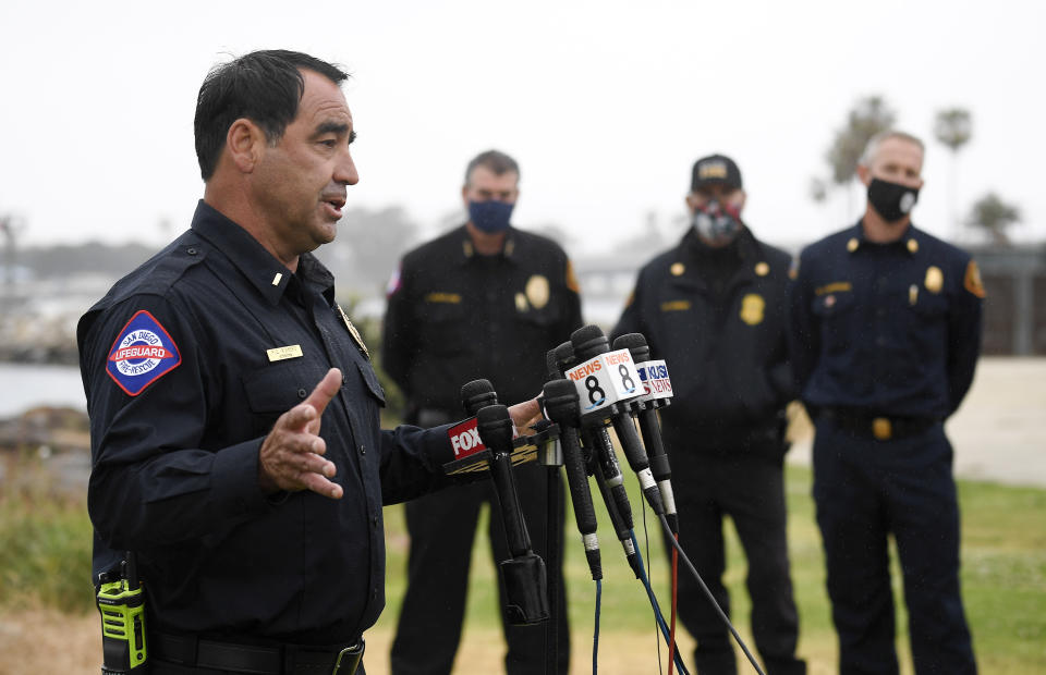 San Diego Lifeguard Lt. Rick Romero speaks at a news conference held after a boat capsized just off the San Diego coast Sunday, May 2, 2021, in San Diego. (AP Photo/Denis Poroy)