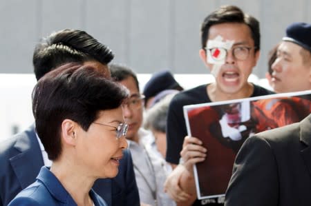 FILE PHOTO: Hong Kong's Chief Executive Carrie Lam meets petitioners outside her office in Hong Kong