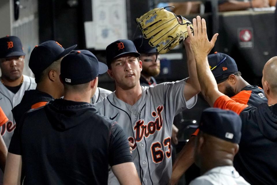 Tigers starting pitcher Beau Brieske is congratulated in the dugout after being pulled during the seventh inning on Thursday, July 7, 2022, in Chicago.