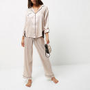 <p><a rel="nofollow noopener" href="http://www.riverisland.com/women/lingerie--nightwear/pyjamas/cream-satin-pyjama-box-set-691349" target="_blank" data-ylk="slk:River Island, £40;elm:context_link;itc:0;sec:content-canvas" class="link ">River Island, £40</a> </p>