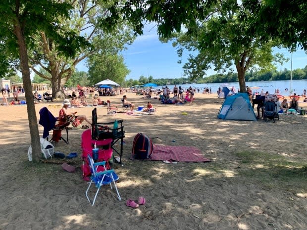 People packed the beach at Mooney's Bay Park on Saturday. (Natalia Goodwin/CBC  - image credit)