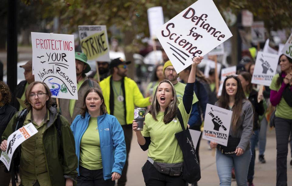 Striking members of the California Association of Professional Scientists march in Sacramento, Calif., Wednesday, Nov. 15, 2023. Thousands of scientists who work for California have begun a three-day strike over lack of progress on contract talks. (Paul Kitagaki Jr./The Sacramento Bee via AP)