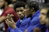 Kansas' David McCormack, right, and Ochai Agbaji speak to the media during Big 12 NCAA college basketball media day Wednesday, Oct. 20, 2021, in Kansas City, Mo. (AP Photo/Charlie Riedel)