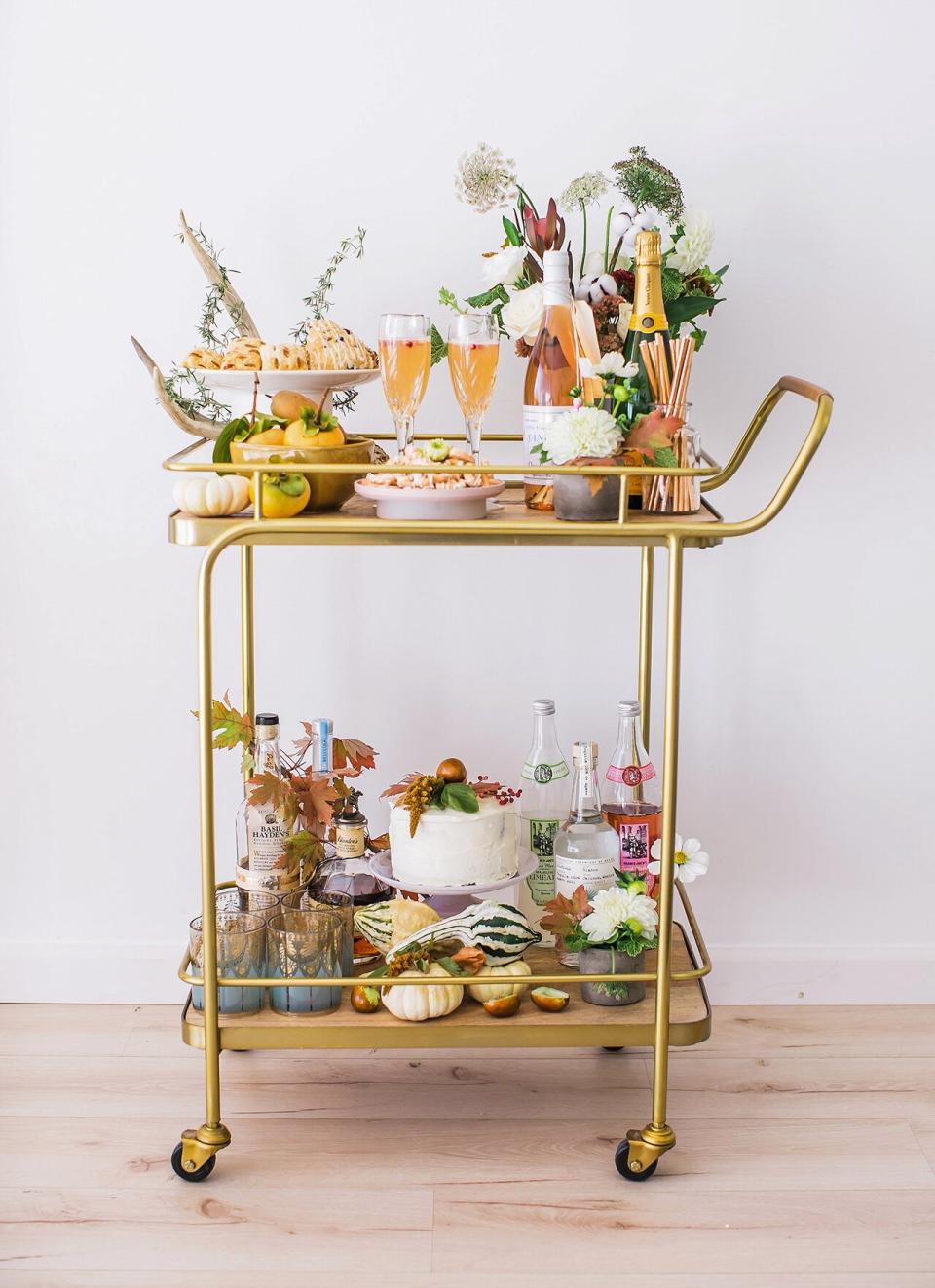 fall decorated gold bar cart