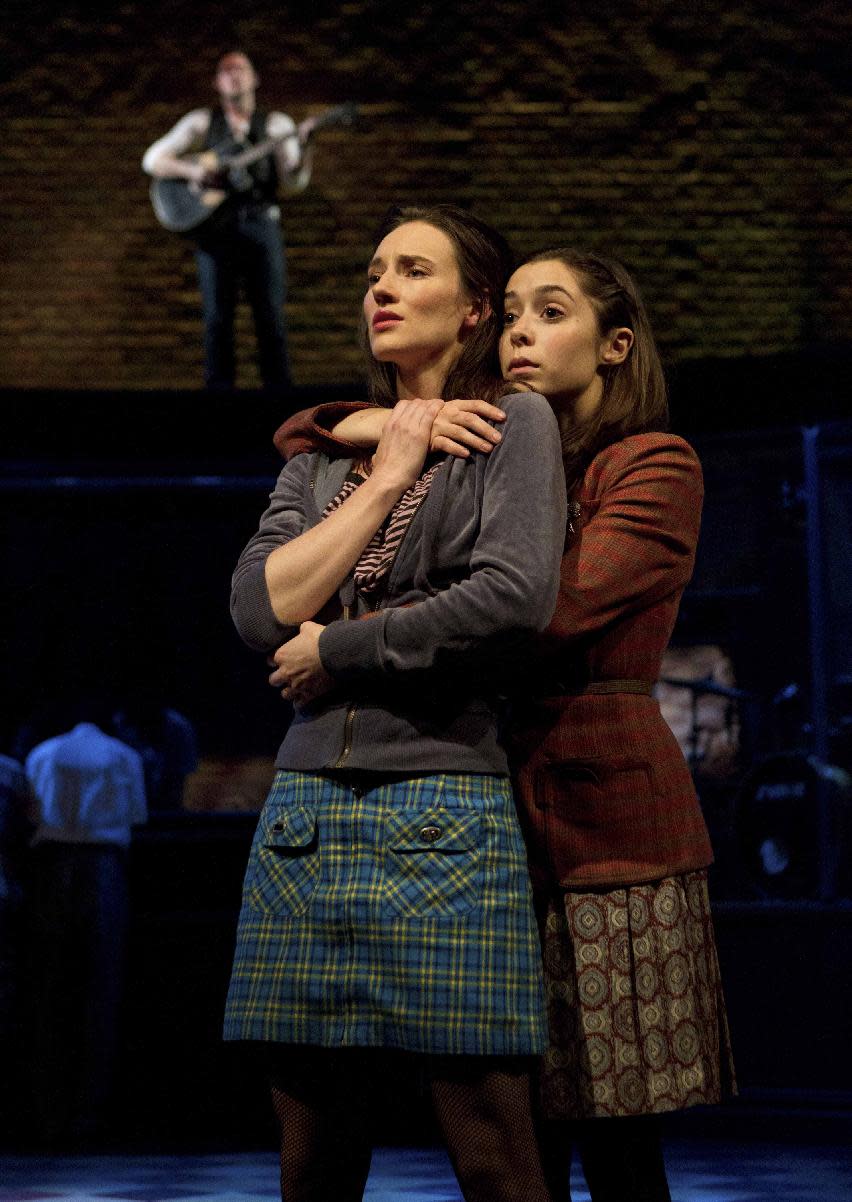 In this theater image released by Boneau/Bryan-Brown, Elizabeth A. Davis, left, and Cristin Milioti are shown during a performance of the musical "Once." After years of toil in regional theater and off-Broadway, Davis made her Broadway debut in March in the hit musical "Once" and promptly earned her first Tony Award nomination. Davis was nominated for best featured actress in a musical. The Tony Awards will be broadcast live on CBS on June 10. (AP Photo/Boneau/Bryan-Brown, Joan Marcus)